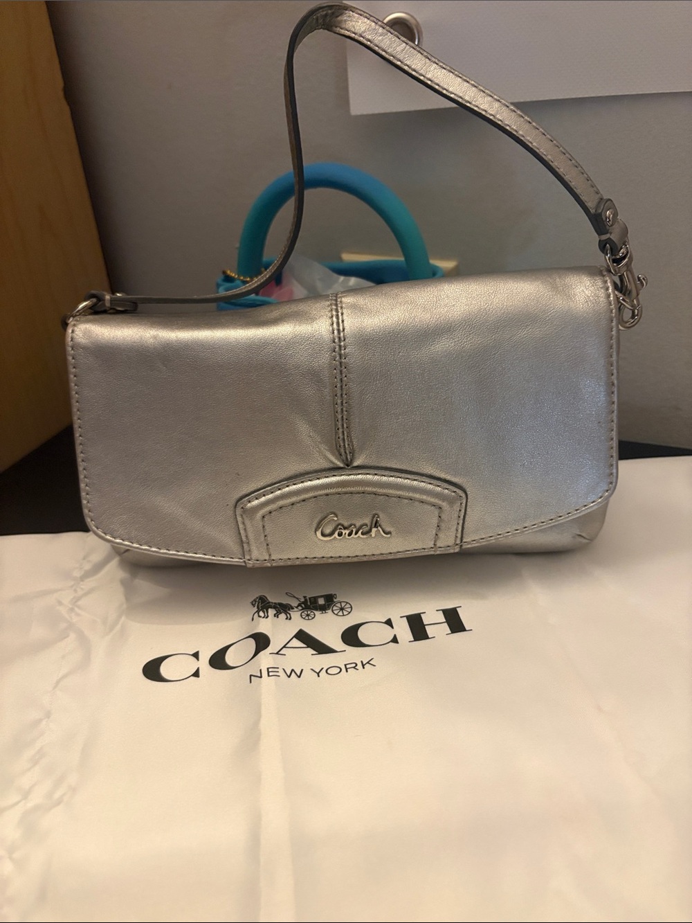 Coach Metallic Silver Leather Wristlet Clutch